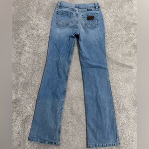 Slim, girls bootcut Wranglers.